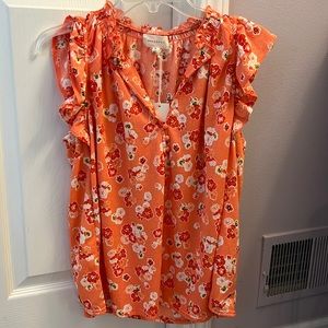 Floral Cap Sleeve shirt by Melloda